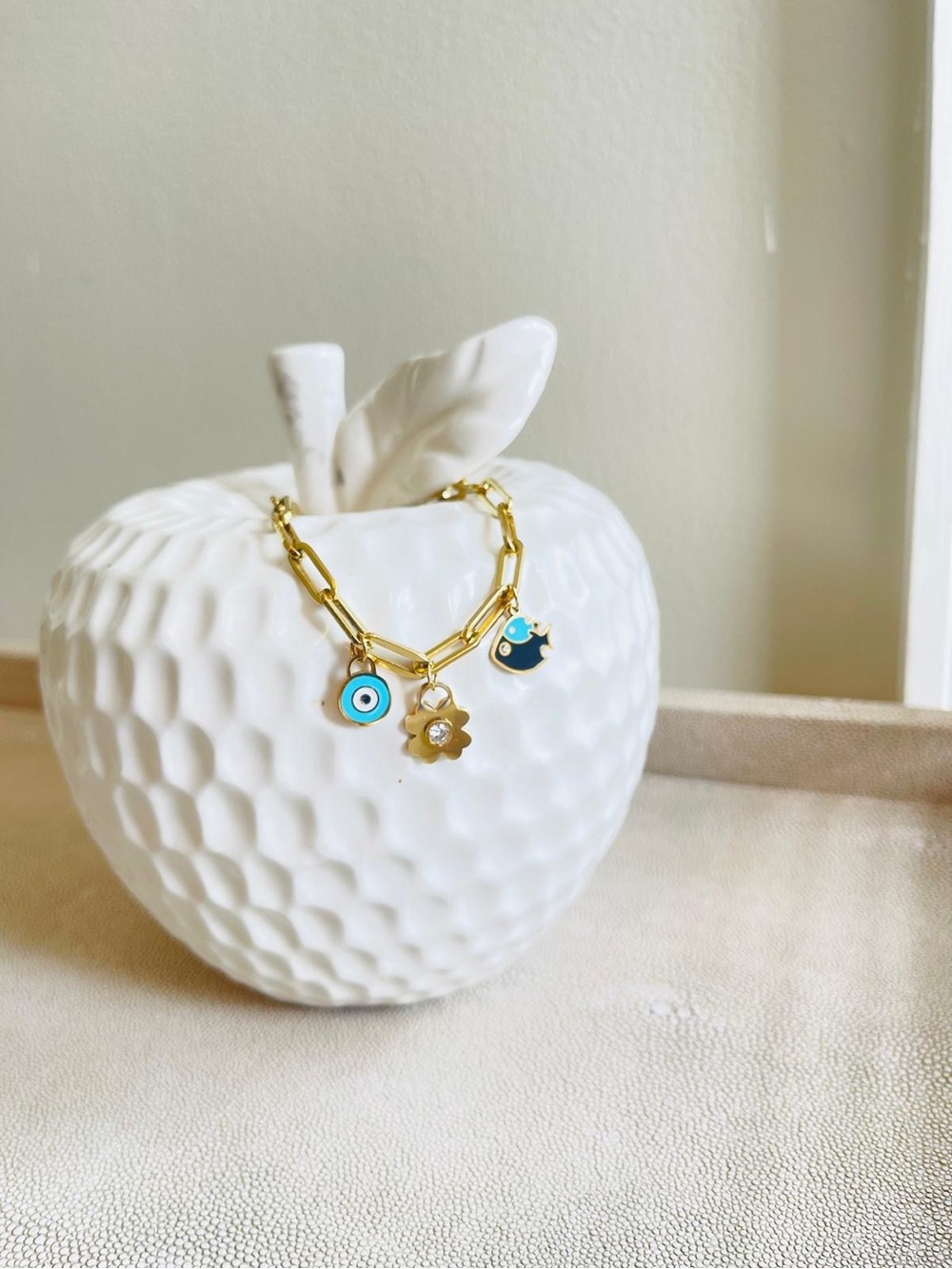 Gold Charm Link Bracelet with Blue Evil Eye and Flower Charms